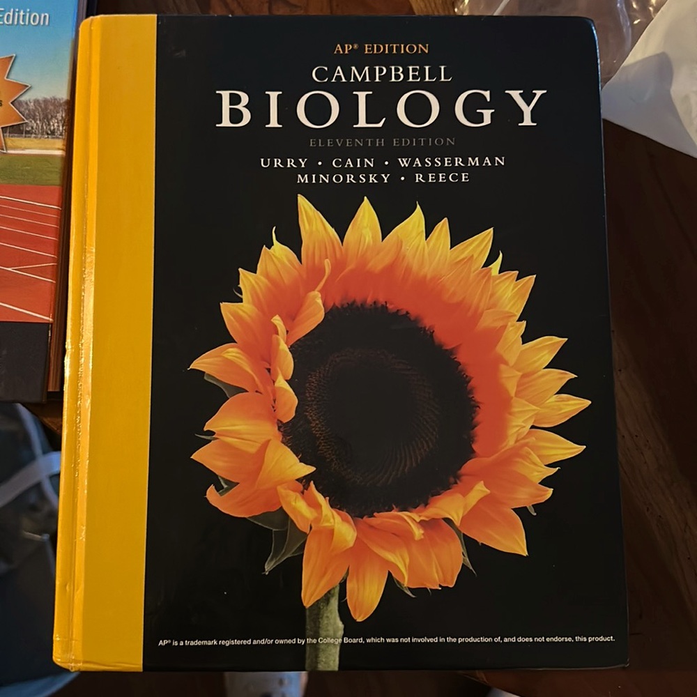 Pearson Campbell Biology Textbook with Black Cover and Yellow Spine